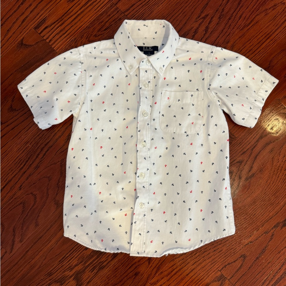E.L.K. short sleeve button down shirt with anchor pattern. Boys size 7.